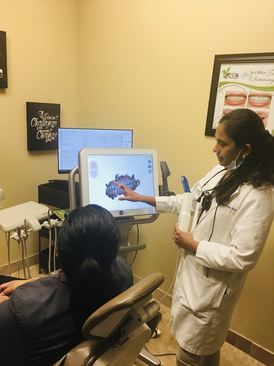 Dr. Reddy walking a patient through a 3D iTero intraoral scan for a crown restoration — Chandler dentist, Natural Smiles Dentistry
